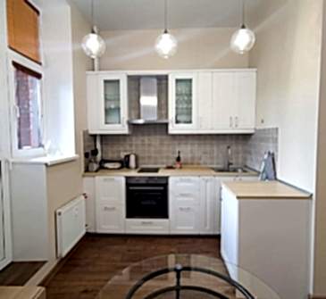 Фото выполненного бюджетного ремонта гостиной в студии 35 м2 в стиле Лофт Фото 1