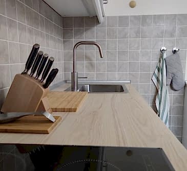 Фото выполненного бюджетного ремонта гостиной в студии 35 м2 в стиле Лофт